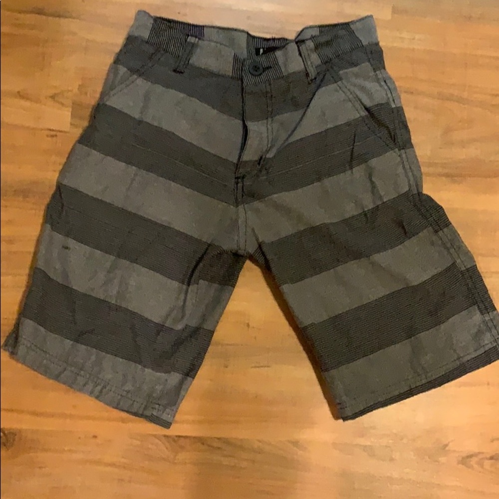 grey and black boy shorts